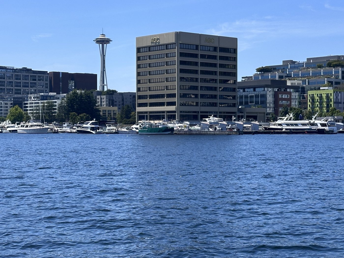 The AGC Building at 1200 Westlake Avenue N, seen across Lake Union with the Space Needle behind it